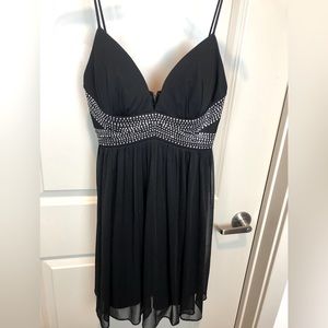 Flattering womens little black dress with rhinestones size small
